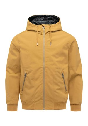 Sennepsgul hættejakke med lynlås foran, snoretræk, lynlåslommer i siden samt ribbede manchetter og kant.