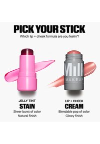 Two lip and cheek sticks: pink Jelly Tint Stain with sheer natural finish, and gray Milk Makeup Lip + Cheek Cream with blendable glowy finish.