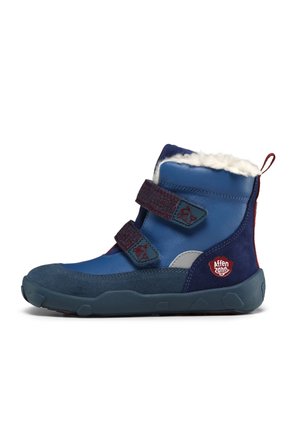 Blue and navy kids' winter boot with two adjustable straps, white fleece lining, red loop pull tab, and rubber sole.
