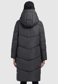 Dark gray puffer coat featuring a chevron pattern, long sleeves, and a hood. The fabric has a smooth texture and a logo detail at the bottom.