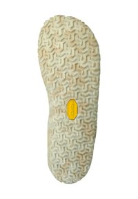 Vibram buitenzool met een hexagonaal loopvlakpatroon, lichtbeige kleur en geel logo. Getextureerd rubber voor grip en duurzaamheid.