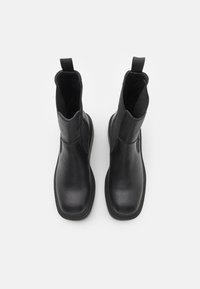 HUGO MEGHAN - Bottines à plateau - black