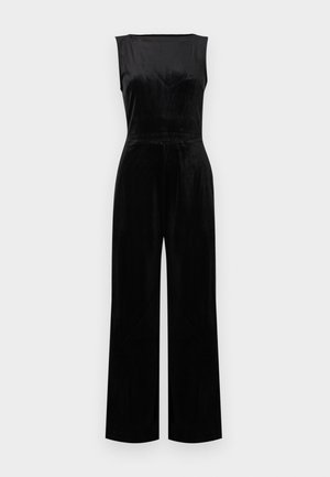 Ermeløs svart velourkjeledress med høy hals og bukser med vide ben, designet i minimalistisk stil.