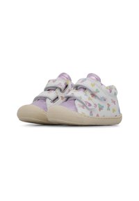 White sneakers with colorful heart patterns, purple accents, and two Velcro straps. Textured rubber sole, rounded toe design.