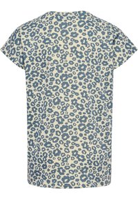 Kortärmad t-shirt i krämfärg med blå cirkulär leopardmönster, rund halsringning och mjukt tyg. Avslappnad passform.