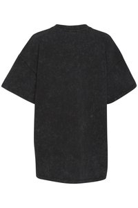 Svart oversized t-skjorte med rund hals, korte ermer, og en teksturert, litt falmet utseende med en avslappet passform.