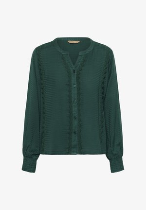 Žalia ilgarankovė palaidinė su V formos iškirpte, sagomis priekyje, tekstūruota medžiaga, nėrinių detalės palei kraštus ir elastiniai rankogaliai.