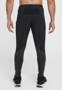 Nike Performance - Spodnie treningowe