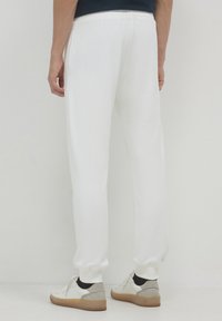 Calliope Jogginghose - bianco