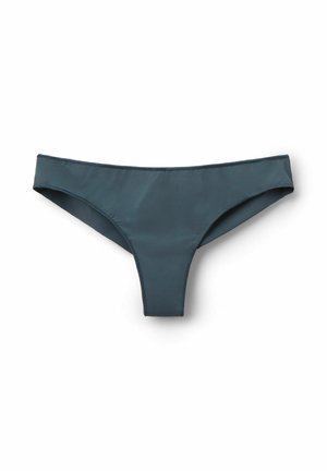 Černé smaragdové thong kalhotky vyrobené z hladkého, elastického materiálu. Mají nízký střih s minimálním pokrytím a elastickým pasem.