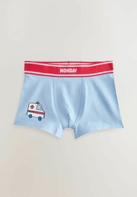 Boxers légers bleus avec une ceinture élastique rouge portant l'inscription "LUNDI." Présente un design d'ambulance imprimé sur le côté gauche.