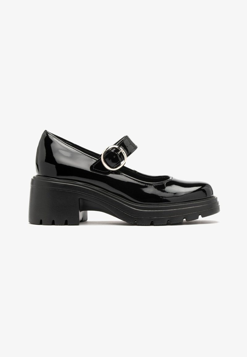 Chaussures Mary Jane en cuir verni noir avec un bout rond, une bride ajustable unique et un talon plateforme épais et texturé.