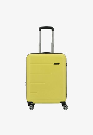 Valigia rigida gialla con superficie testurizzata, quattro ruote girevoli e maniglia telescopica. Chiusura con cerniera e logo del marchio discreto.