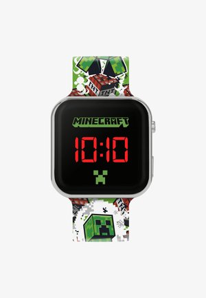 Orologio digitale con display LCD nero che mostra numeri rossi alle 10:10. Dotato di un cinturino multicolore con grafiche e motivi a tema Minecraft.
