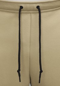 Nike Sportswear SPORTSWEAR TECH FLEECE - Tracksuit bottoms - neutral olive black