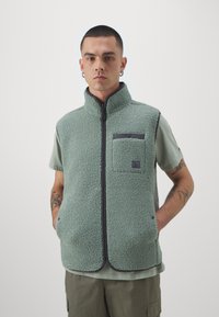 Didriksons VEST UNISEX - Waistcoat - light moss