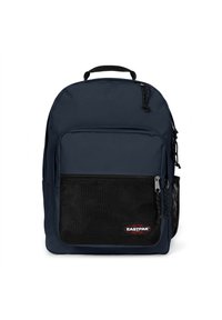 Marinblå tygryggsäck med en frammeshficka, dragkedjestängning, dubbla sidofickor och ett handtag på toppen. Har svarta detaljer.