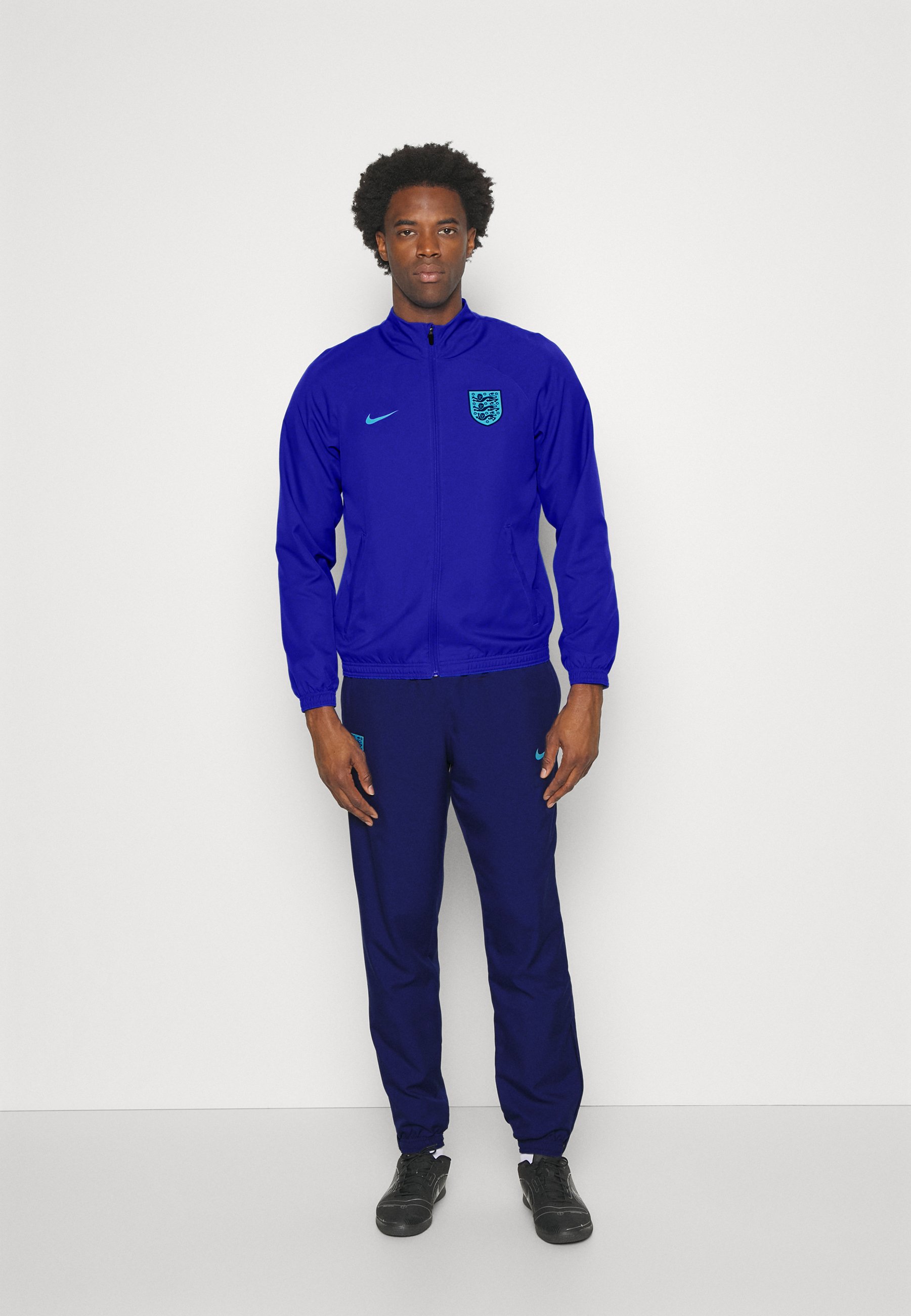 nike track suit blue