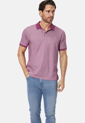 Kurzarm-Poloshirt mit Kragen in helllila mit dunkellila Akzenten, das über ein dezentes geometrisches Muster und eine geknöpfte Knopfleiste verfügt.