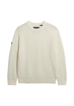 Sweter w kolorze kremowym, dziany, z długimi rękawami raglanowymi oraz ściągaczowym okrągłym dekoltem, mankietami i dolnym wykończeniem.