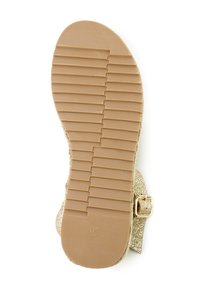 Glittery gold sandal outsole with a textured, beige rubber surface and ridged pattern. Features a side strap with a gold buckle accent. Size 39.
