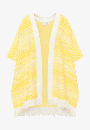 Żółty ponczo w wzór w jodełkę, z prążkowanym białym wykończeniem i białymi frędzlami u dołu. Lekki, oddychający materiał.