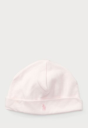 Bonnet en coton rose tricoté avec un revers et un petit logo brodé. Texture douce, forme arrondie et design épuré.