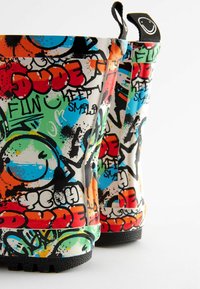 Next Gumáky - bright graffiti