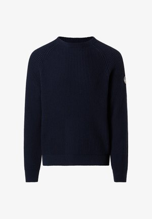 Navy blue knitted sweater with ribbed texture, crew neck, and raglan sleeves. Features a logo patch on the left sleeve.