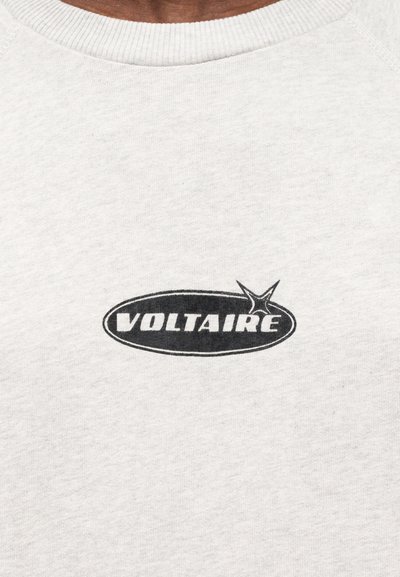 Light gray sweatshirt with ribbed neckline featuring a black printed "VOLTAIRE" logo surrounded by an oval shape and a star accent.
