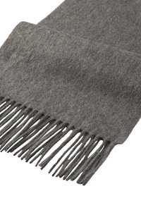Écharpe en laine grise avec des bords à franges, présentant une surface douce et texturée et une forme rectangulaire. Conçue pour la chaleur et le confort.