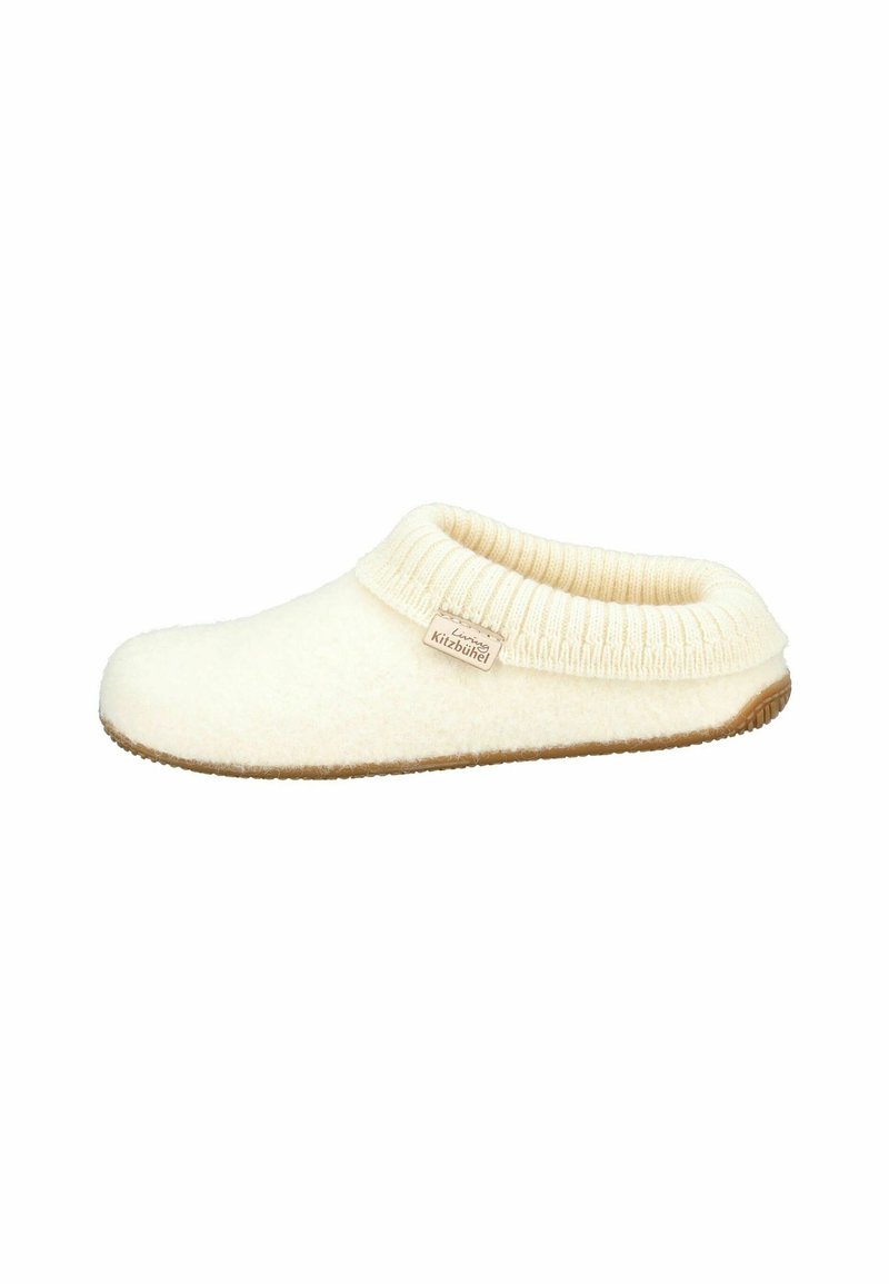 Pantofole in lana color crema con colletto a coste e suola in gomma marrone, dotate di un'etichetta in tessuto sul lato. Texture morbida.