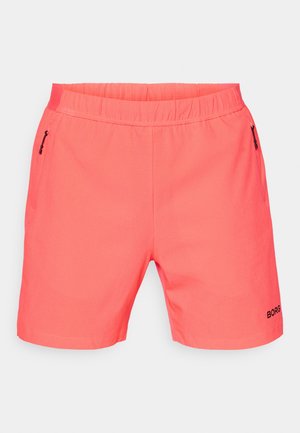 Coral atletikshorts med elastisk talje, to sidelommer med lynlås, tekstureret stof og "BORG" logo i sort ved kanten.