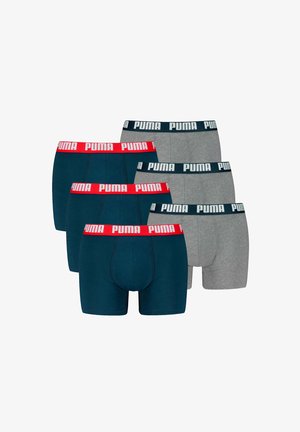 Conjunto de bóxer de Puma, que incluye una opción en color navy con una cinturilla roja, un par en gris oscuro y otro en gris claro, todos en mezcla de algodón.