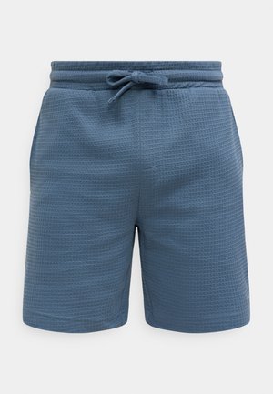 Hellblaue, strukturierte Shorts mit elastischem Bund und verstellbarem Kordelzug, mit einem gitterartigen Muster und einem lockeren Schnitt.