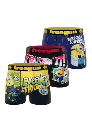 Trois paires de boxers colorés avec des personnages Minions et des phrases comme "Breakin' Thru," "Crushin' It," et "What Could Go Wrong?" dessus.