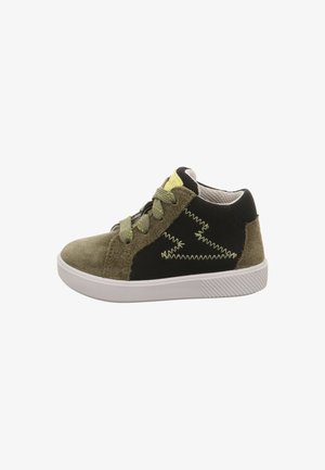 Green and black suede sneaker with a white rubber sole, featuring yellow accents and zigzag stitching detail on the side.