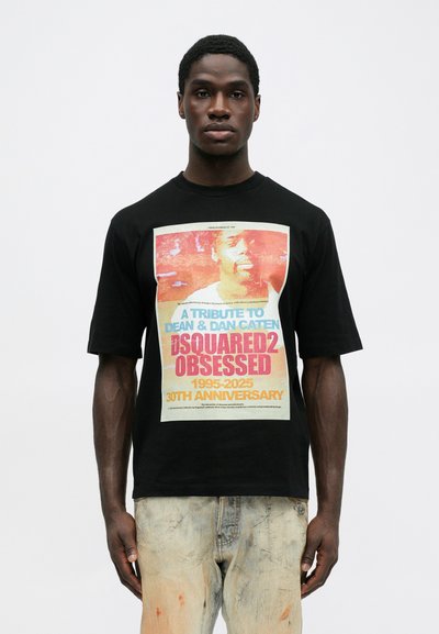 Tricou din bumbac negru cu un imprimeu grafic colorat care sărbătorește a 30-a aniversare a DSQUARED2, cu mâneci scurte și o croială lejeră.