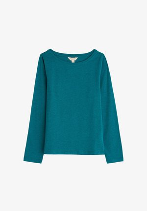 Mėlyna ilgomis rankovėmis marškinėliai, pagaminti iš minkštos, lengvos medžiagos. Pasižymi platų apvaliu dekolte ir paprastu, nepuošiamiu dizainu.