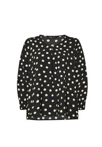 Svart blus med stora vita prickar, V-ringning, långa ärmar, plisserad frontdetalj och avslappnad passform. Texturerad tygfinish.