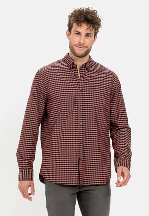Men's long-sleeve shirt with a red and black checkered pattern, button-down collar, and front pocket. Soft cotton fabric and standard fit.