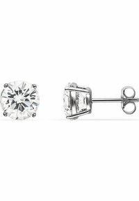 Round clear crystal stud earrings set in silver-tone metal. The design features four prongs holding each stone, with a post back closure.