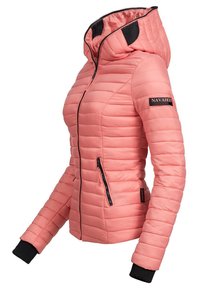 Lightweight coral puffer jacket with horizontal quilting, zip pockets, and black ribbed cuffs. Features a hood and branded sleeve patch.