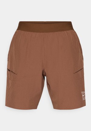 Braune Shorts mit einem elastischen Bund, zwei seitlichen Taschen und einem weißen Logodetail. Hergestellt aus leichtem Stoff mit einer glatten Textur.