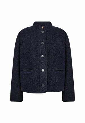 Tamsiai mėlynas tekstūruotas švarkelis su apvalia iškirpte, priekyje sagomis ir dviem šoniniais kišenėmis. Pagamintas iš minkštos medžiagos, pasižymi laisvu kirpimu.