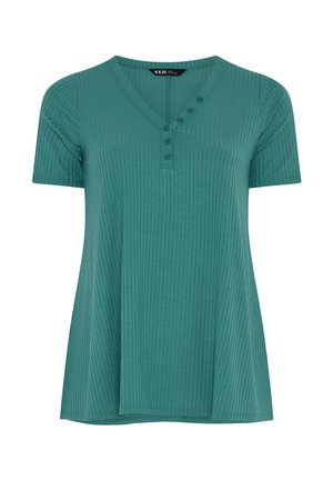 Sininen ribbineulottu lyhythihainen paita V-kaula-aukkolla ja viidellä napilla helman aukikappaleessa, hieman levenevä helma, valmistettu pehmeästä, joustavasta kankaasta.