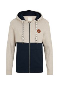 Felpa con zip beige e blu navy, con cordini, tasche frontali e una piccola etichetta rotonda in pelle sul petto.