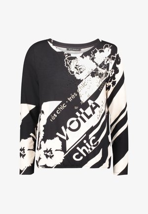 Zwart-wit lange mouw top met grafische print, voorzien van bloemenpatronen en tekst. Zacht materiaal, losse pasvorm, ronde halslijn en contrasterende strepen.