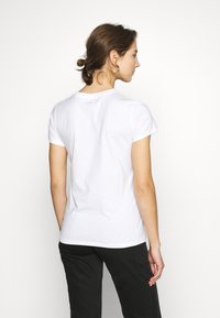 Levi's® THE PERFECT TEE - Tričko s potlačou - gold