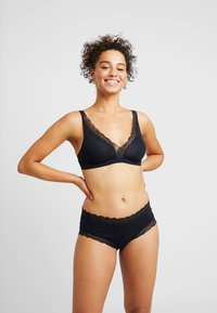 Hanro SOFT CUP - Kaarituettomat rintaliivit - black